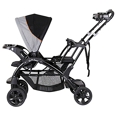 Baby Trend Sit N&#39; Stand Double Stroller in Millennium Orange. View a larger version of this product image.