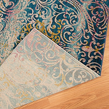 United Weavers Rhapsody Midlothian Tufted Accent Rug in Cyan. View a larger version of this product image.