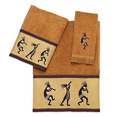 Avanti Kokopelli Fingertip Towel in Nutmeg. View a larger version of this product image.