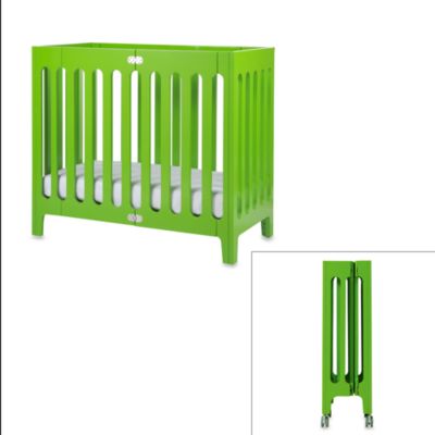 green mini crib