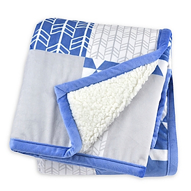 Just Born&reg; Patchwork Plush Blanket in Blue. View a larger version of this product image.