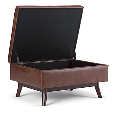 Simpli Home Owen Faux Leather Coffee Table Storage Ottoman in Distressed Saddle Brown. View a larger version of this product image.