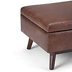 Alternate image 4 for Simpli Home Owen Faux Leather Coffee Table Storage Ottoman in Distressed Saddle Brown