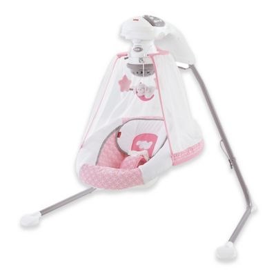 pink and white baby swing