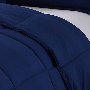 Clean Living Stain and Water Resistant 3-Piece Full/Queen Comforter Set in Navy. View a larger version of this product image.