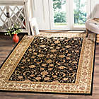 Alternate image 1 for Safavieh Lyndhurst Scroll Pattern 6-Foot x 9-Foot Rug in Black and Ivory
