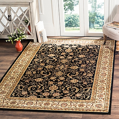 Safavieh Lyndhurst Scroll Pattern 5-Foot 3-Inch x 7-Foot 6-Inch Rectangle Rug in Black and Ivory. View a larger version of this product image.