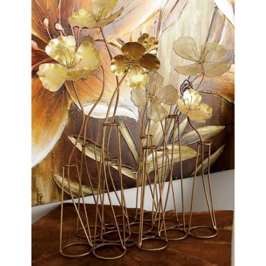 Ridge Road D&eacute;cor Floral Iron Sculpture in Gold. View a larger version of this product image.