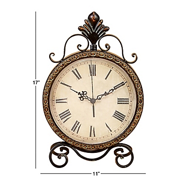 Ridge Road D&eacute;cor Wrought Iron Analog Table Clock in Bronze. View a larger version of this product image.