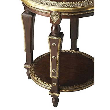 Butler Ranthore Round Brass Accent Table in Dark Brown. View a larger version of this product image.