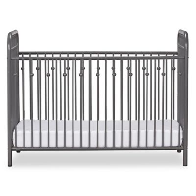 gray metal crib