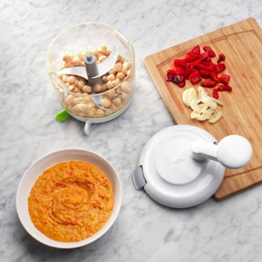 OXO Good Grips&reg; One Stop Chop Manual Food Processor in White/Green. View a larger version of this product image.