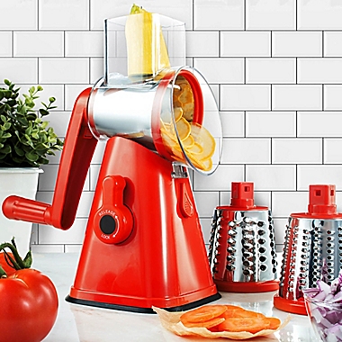 NutriSlicer&trade; 3-in-1 Spinning/Rotating Mandoline and Countertop Food Slicer in Red. View a larger version of this product image.