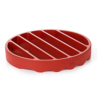 OXO Silicone Pressure Cooker Roasting Rack in Red. View a larger version of this product image.