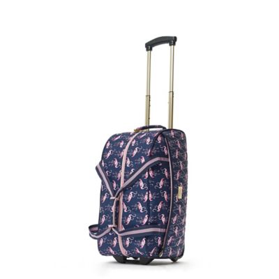 on vacay pink suitcase