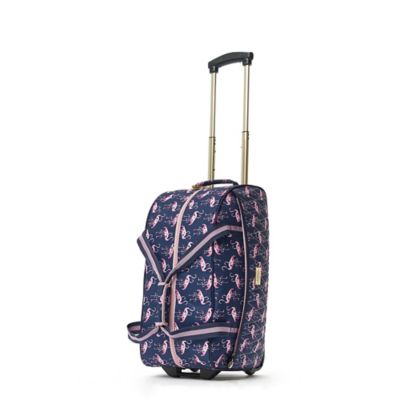 on vacay luggage pink