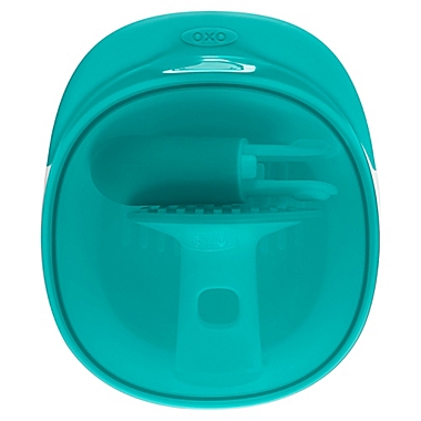 OXO Tot&reg; Food Masher in Teal. View a larger version of this product image.