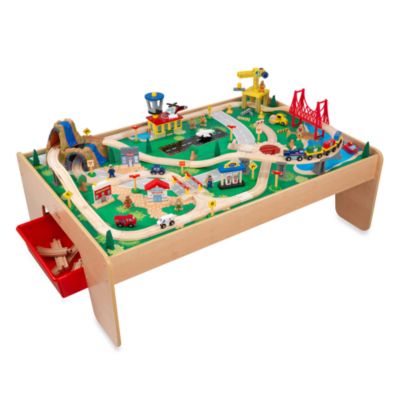 wooden table and train set