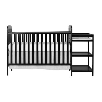 black crib with changing table