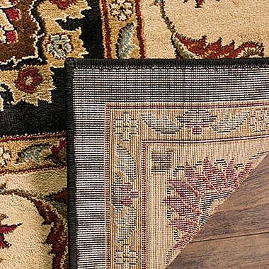 Safavieh Lyndhurst Flower Palmette 5-Foot 3 x 7-Foot 6-Inch Room Size Rug in Black. View a larger version of this product image.
