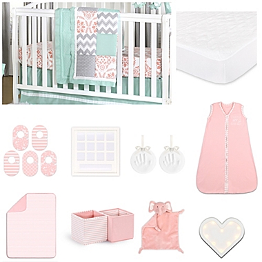 The Peanut Shell&trade; Medallions Crib Bedding Collection in Coral. View a larger version of this product image.