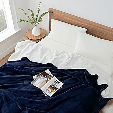 UGG&reg; Avalon Twin Blanket in Navy. View a larger version of this product image.
