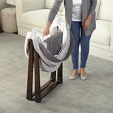 Ingenuity&trade; FoldAway Rocking Wood Bassinet&trade; in Carrington. View a larger version of this product image.