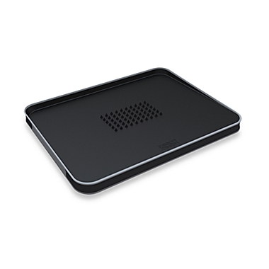 Joseph Joseph&reg; Cut&Carve&trade; Large Plus Multi-Function Chopping Board in Black. View a larger version of this product image.
