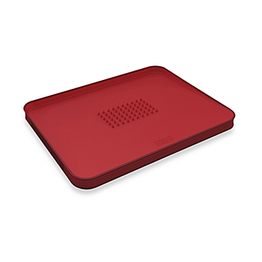 Joseph Joseph&reg; Cut&Carve&#153; Large Plus Multi-Function Chopping Board in Red. View a larger version of this product image.
