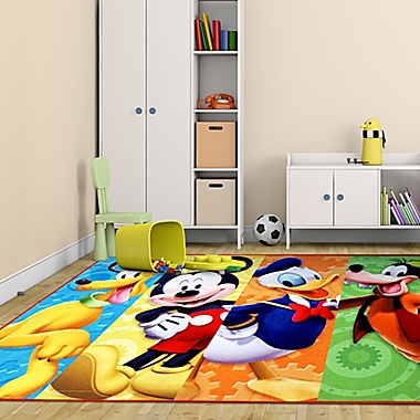 Disney&reg; Mickey Mouse Club House 4&#39;6 x 6&#39;6 Area Rug. View a larger version of this product image.