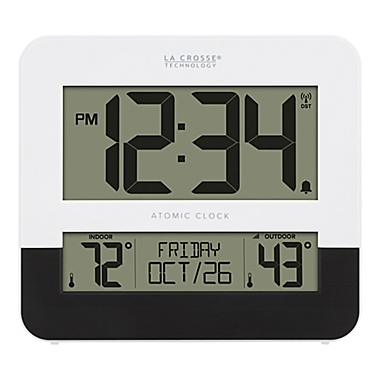 La Crosse 8.54-Inch Atomic Digital Wall Clock with In/Outdoor Temperature in Black/White. View a larger version of this product image.