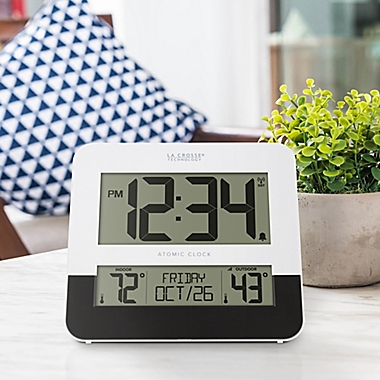 La Crosse 8.54-Inch Atomic Digital Wall Clock with In/Outdoor Temperature in Black/White. View a larger version of this product image.