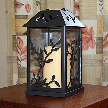 Metal Vine Lantern with LED Candle and Timer in Black. View a larger version of this product image.
