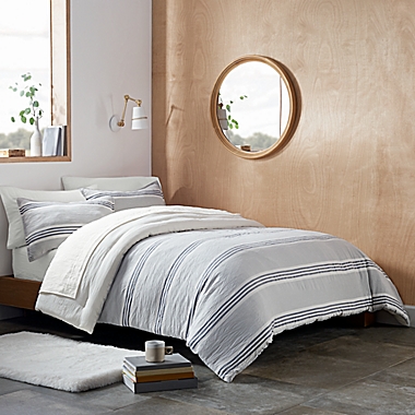 UGG&reg; Devon Stripe 2-Piece Reversible Twin/Twin XL Comforter Set in Navy Stripe. View a larger version of this product image.