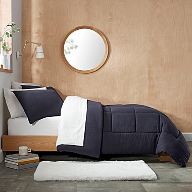 UGG&reg; Devon 3-Piece Reversible King Comforter Set in Navy. View a larger version of this product image.