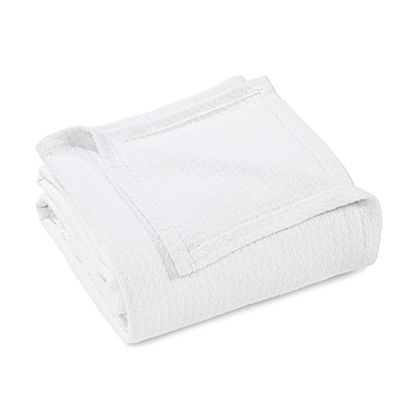 Jasper Haus Galettes Textured Throw Blanket in White. View a larger version of this product image.