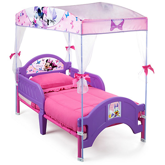 Alternate image 1 for Delta Children® Disney® Minnie Mouse Canopy Toddler Bed in Pink