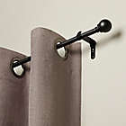 Alternate image 1 for Umbra&reg; Cafe 18 to 28-Inch Adjustable Curtain Rod in Black