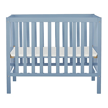 Dream On Me Edgewood 4-in-1 Convertible Mini Crib in Dusty Blue. View a larger version of this product image.