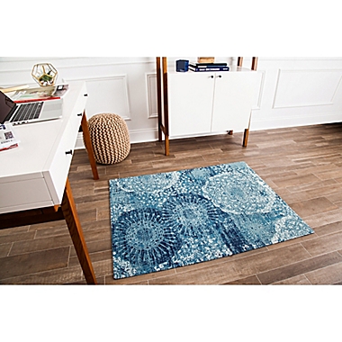Anji Mountain&reg; Maldives Handcrafted 0.25&quot; Rug&#39;d Chair Mat in Blue/Ivory. View a larger version of this product image.