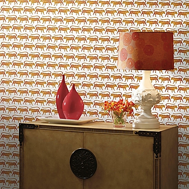 RoomMates&reg; Cat Coquillette Jaguars Peel &amp; Stick Wallpaper in Orange. View a larger version of this product image.