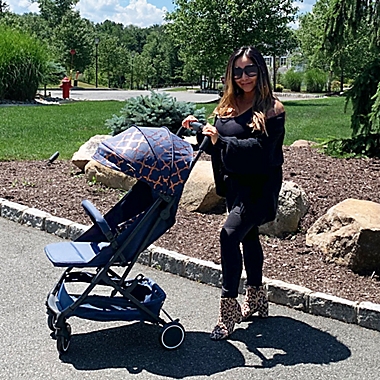 Your Babiie MAWMA By Snooki Soho Compact Travel Stroller in Navy. View a larger version of this product image.