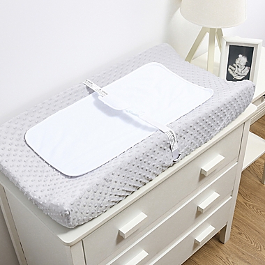The Peanutshell&trade; 4-Pack Waterproof Changing Pad Liners in White. View a larger version of this product image.