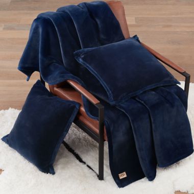 UGG&reg; Throw Blanket Coco Luxe in Navy. View a larger version of this product image.