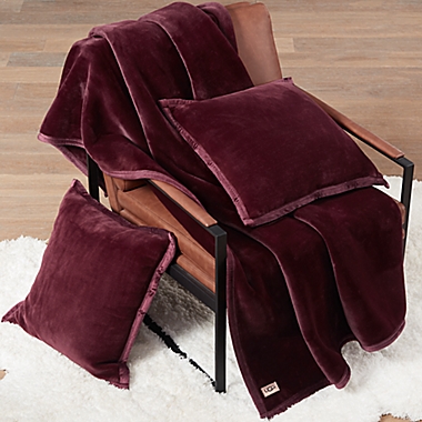 UGG&reg; Coco Luxe Square Throw Pillows in Cabernet (Set of 2). View a larger version of this product image.