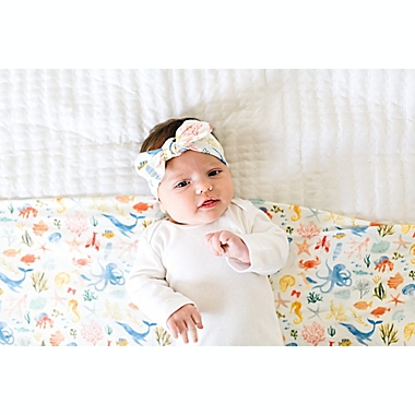 Copper Pearl&trade; Newborn Nautical Bow Headband in Blue/White. View a larger version of this product image.