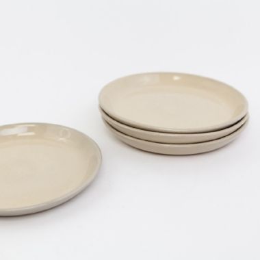 Carthage.co La Marsa Bread Plates in Muslin (Set of 4). View a larger version of this product image.
