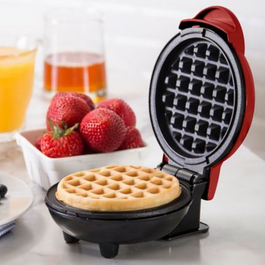 Dash&reg; Mini Waffle Maker in Red. View a larger version of this product image.