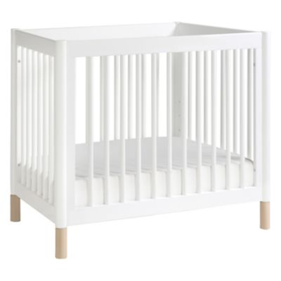 white wooden crib