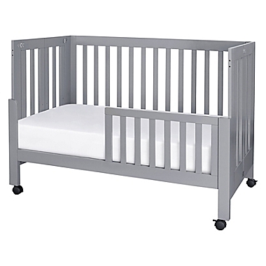 Babyletto Maki Full Size Portable Crib in Grey. View a larger version of this product image.
